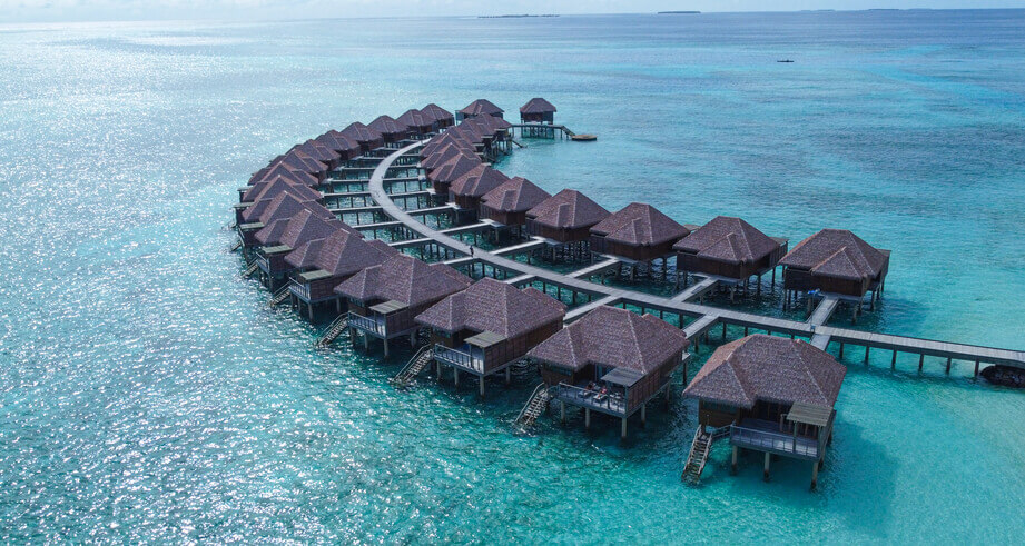 Jump into the sea directly from your Maldives villa during your digital detox getaway.