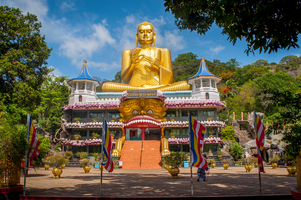 Big Golden Buddha Temple of Dambulla a UNESCO heritage site. Buildings and attractions of Sri Lanka.