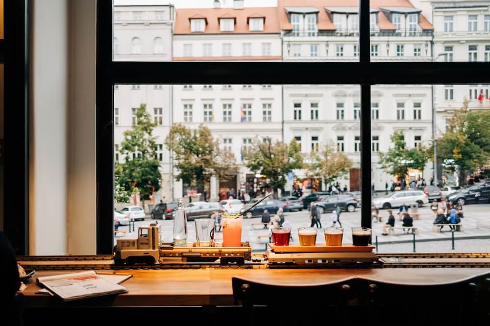 Beer at the window of a Prague city centre pub