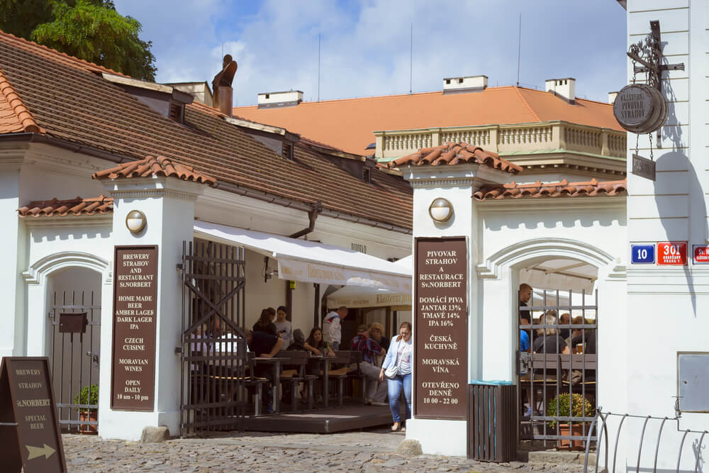Gated entrance to a Prague monastery brewery