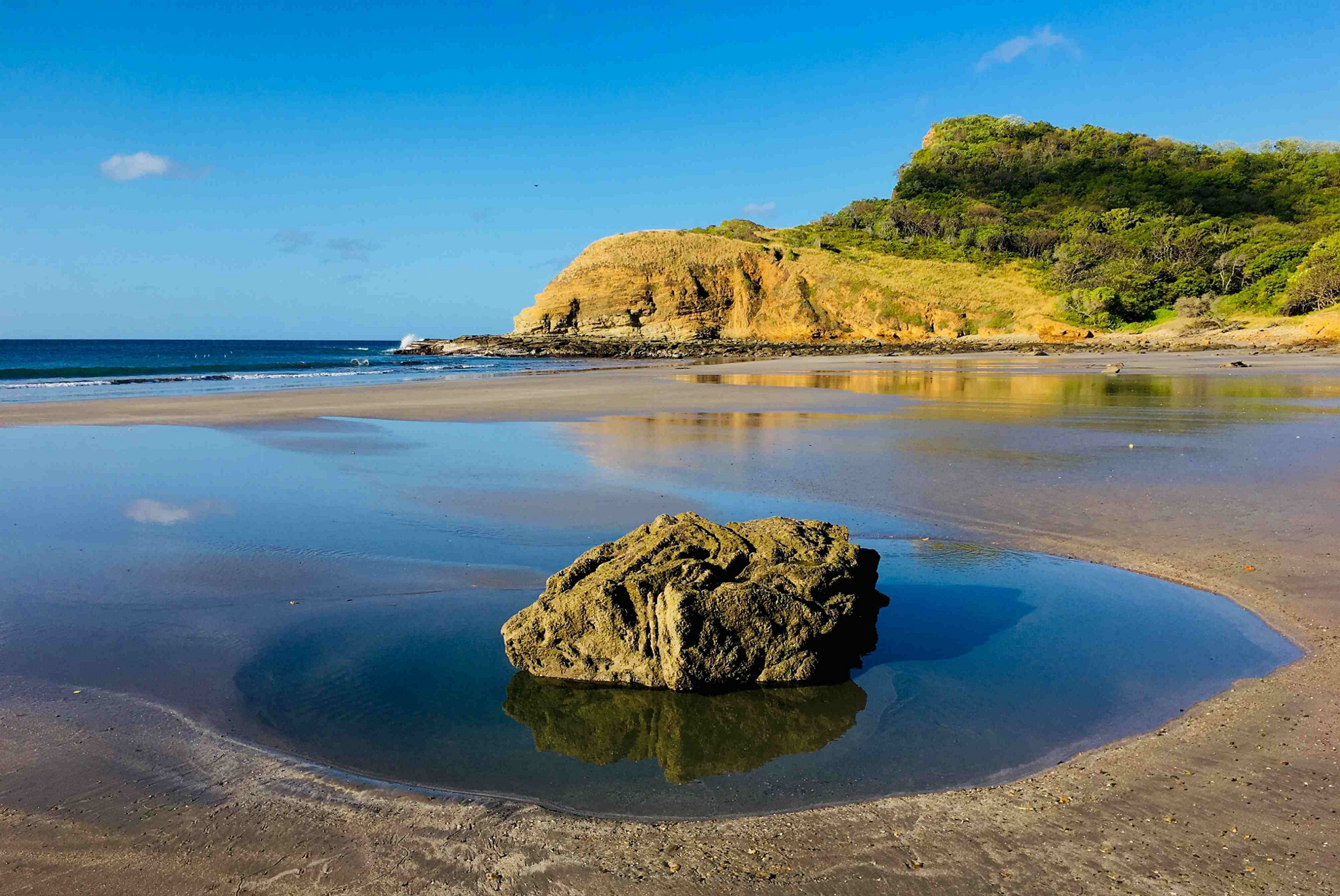 The best beaches in Nicaragua feature stunning cliffs and green vegetation