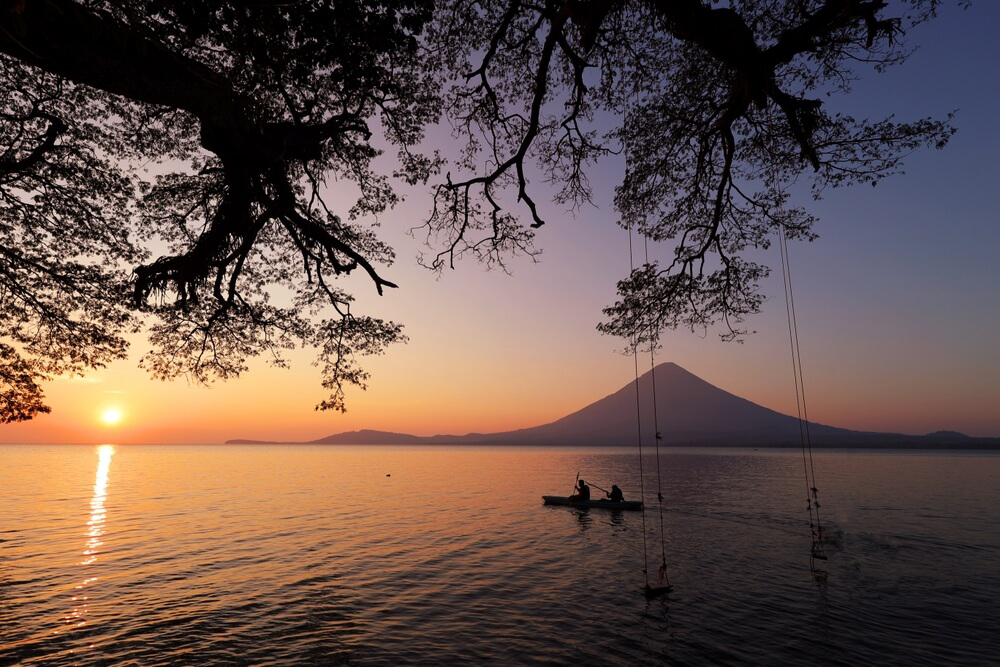 View of the island and Mango beach from the mainland at sunset
