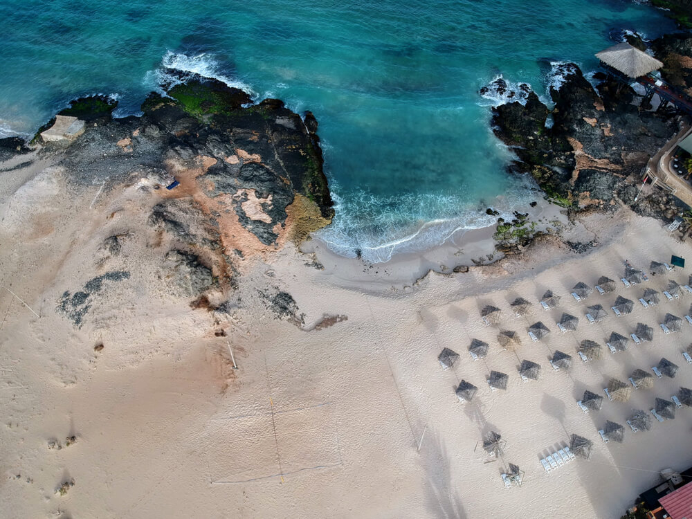 Boa Vista Beaches: bird’s eye view of Praia de Cabral beach with umbrellas and loungers