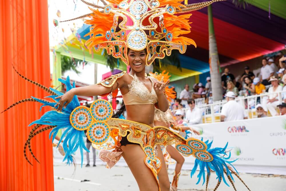 Carnival in the Dominican Republic: A lady dressed in an elaborate carnival costume