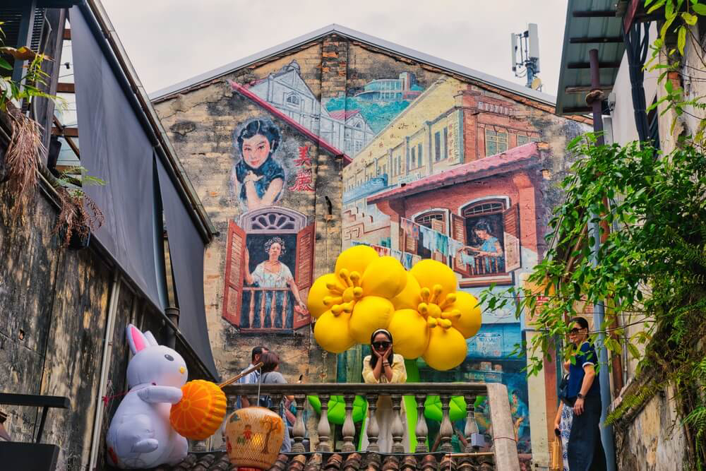 A mural and decorations in Kuala Lumpur’s Chinatown