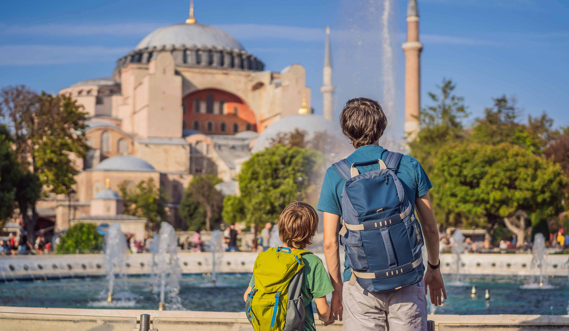 City breaks with kids: a parent and child contemplate Hagia Sophia mosque in Istanbul