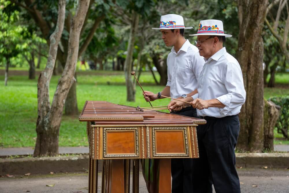 Two men playing Costa Rican calypso music in a park