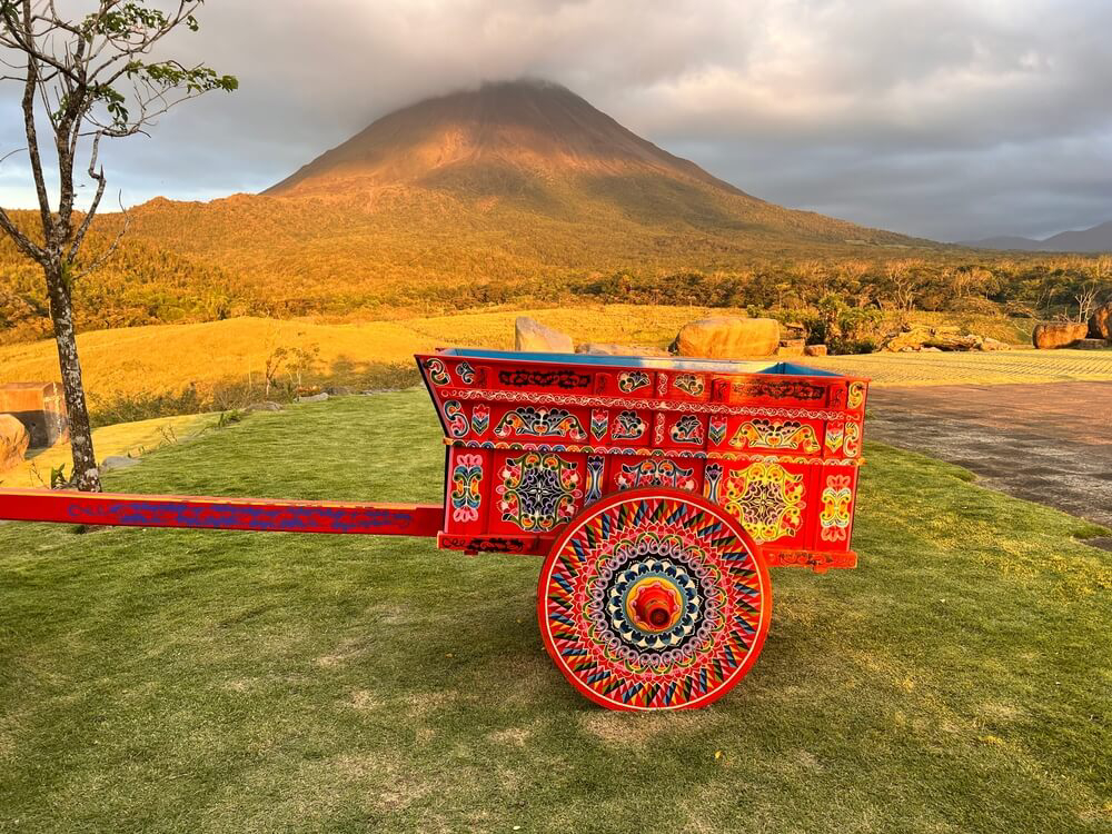 One of Costa Rica’s painted oxcarts with Arenal volcano in the background