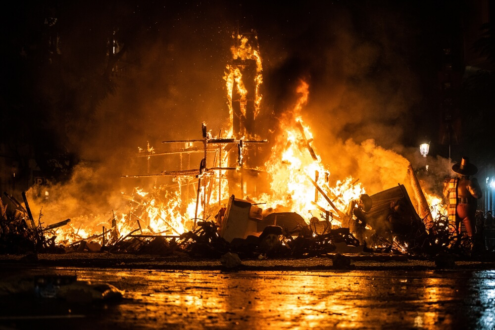 Sculptures of wood and papier-mache burn in a Valencian square