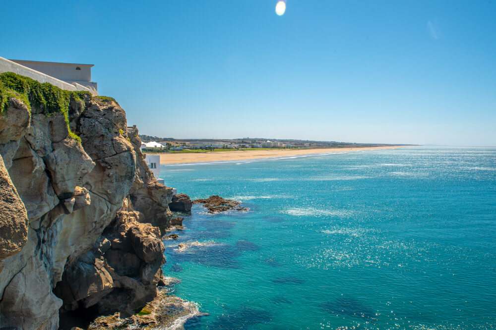Ferry to Tangier: A view of the golden Tangier coastline from the Ocean