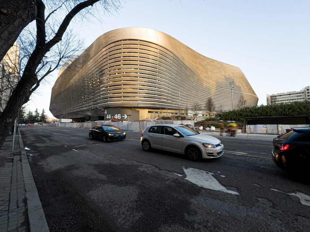 Football Stadiums in Spain: A street in Madrid with the Santiago Bernabéu stadium on the corner