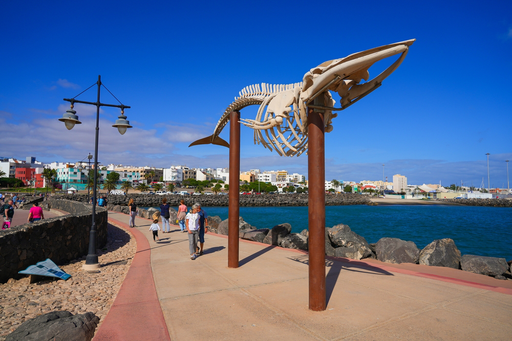 People strolling a waterfront promenade in Puerto del Rosario, Fuerteventura