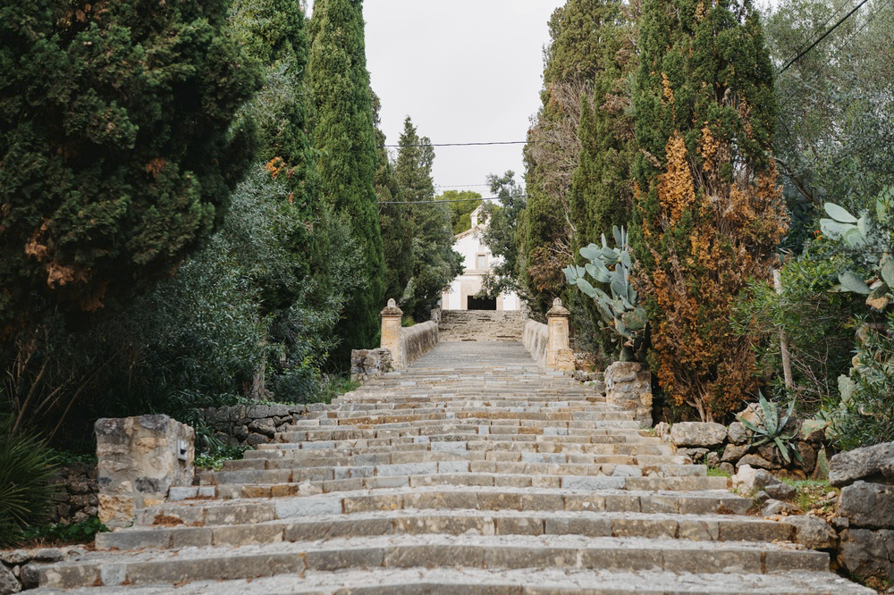 The Calvari steps in Pollença, lined by cypress trees and other greenery