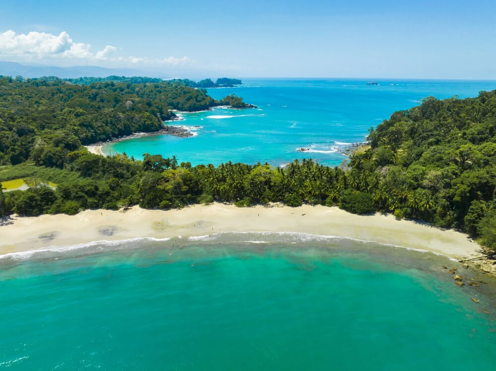 National parks in Costa Rica feature lush forests and white-sand beaches.