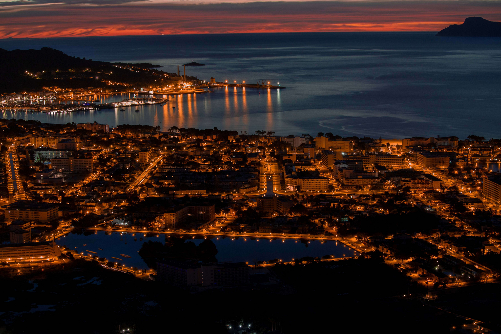 Nightlife in Mallorca: an aerial view of Alcudia by night
