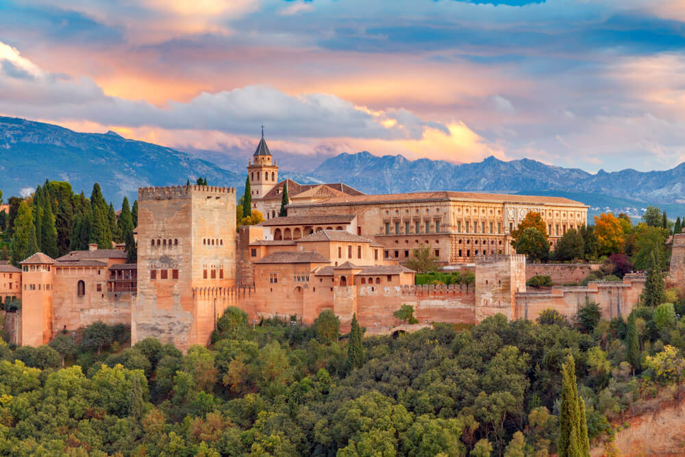 The Alhambra palace in Granada backed by the mountains of Sierra Nevada