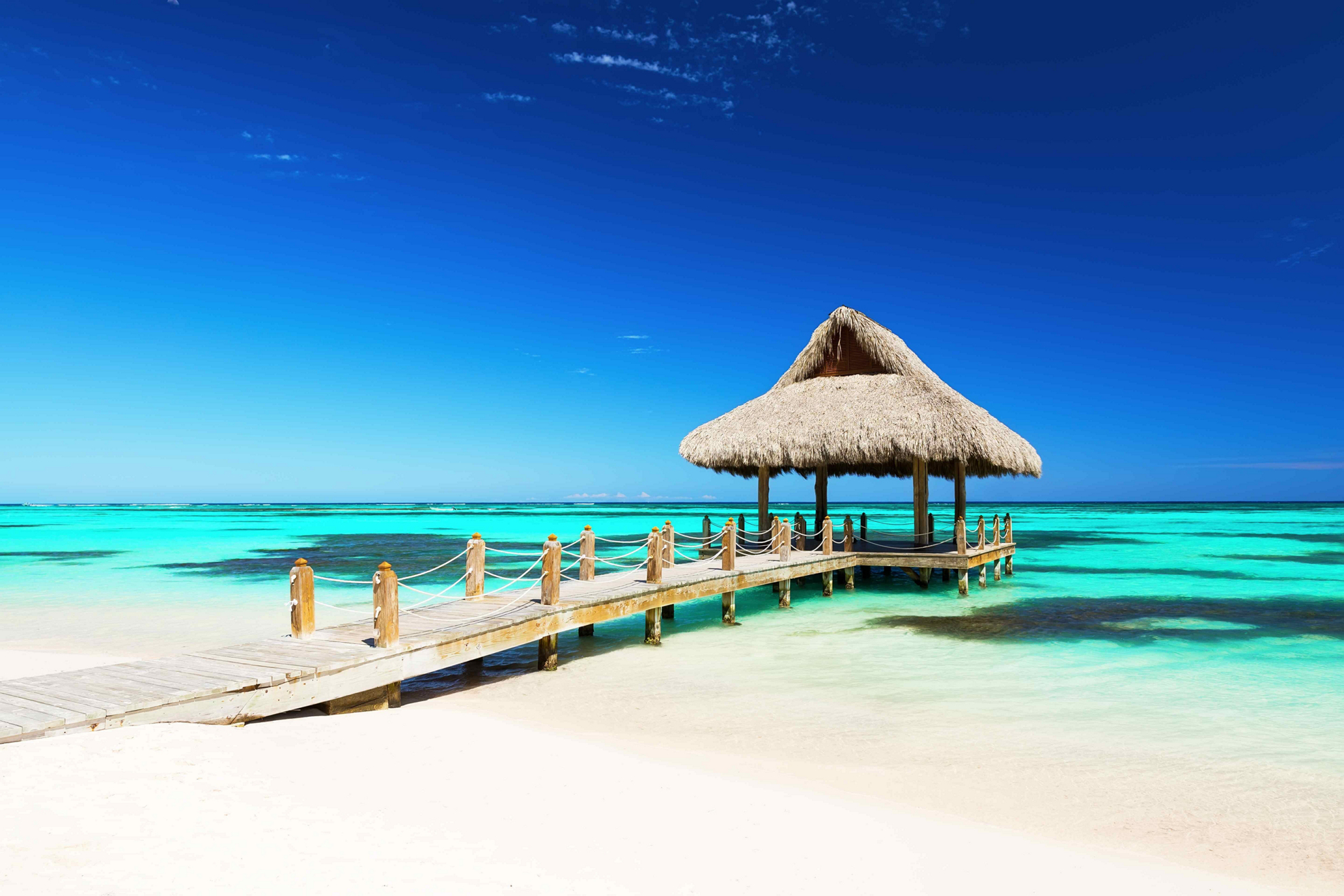 Walking onto this dock leading into clear waters is one of the best Punta Cana activities.