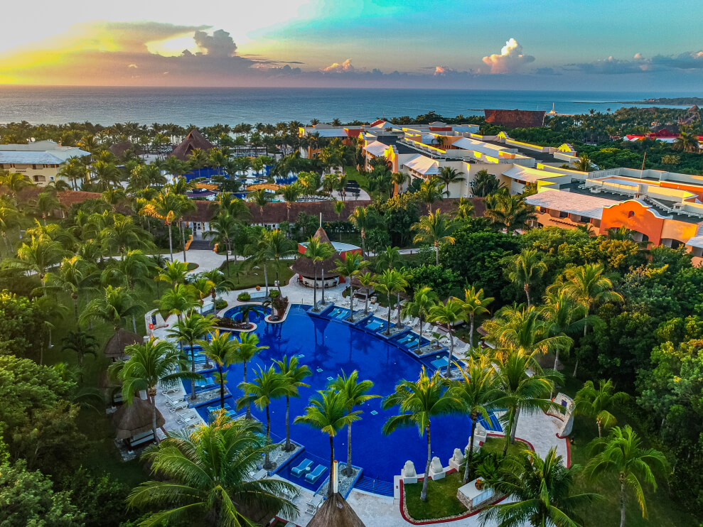 Aerial view of Barceló Maya Grand Resort at sunset, before the Riviera Maya nightlife action begins