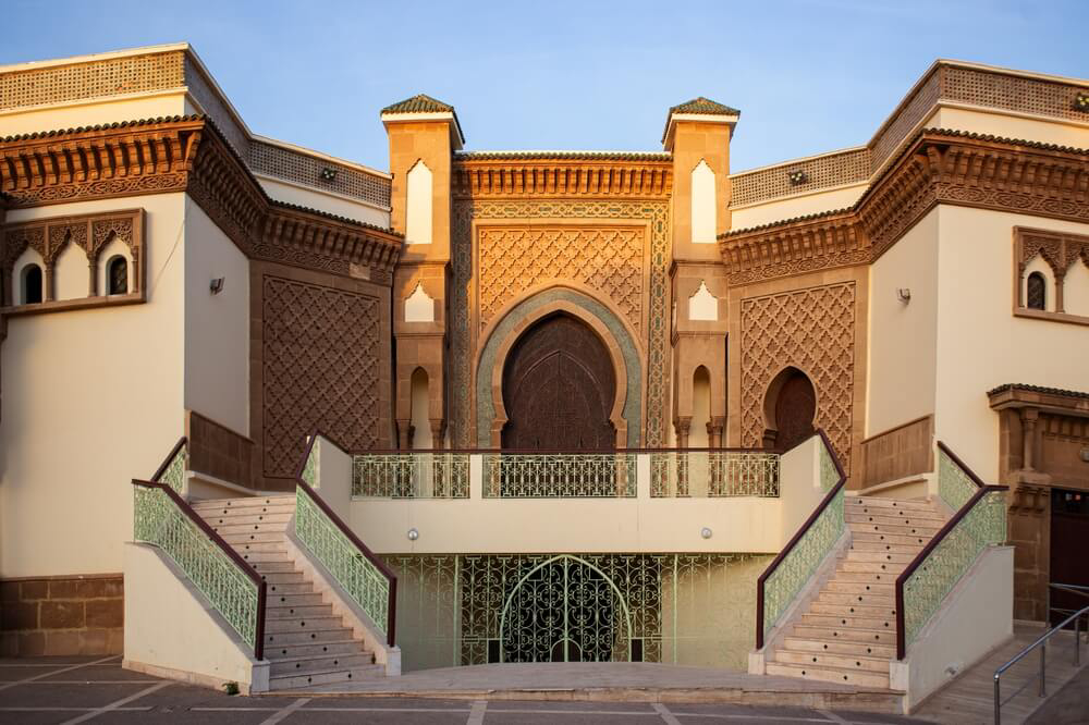 Mohammed V Mosque: The ornate facade of the mosque with two stairways at the door