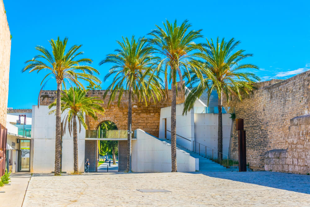 Es Baluard: A sandstone courtyard with palm trees