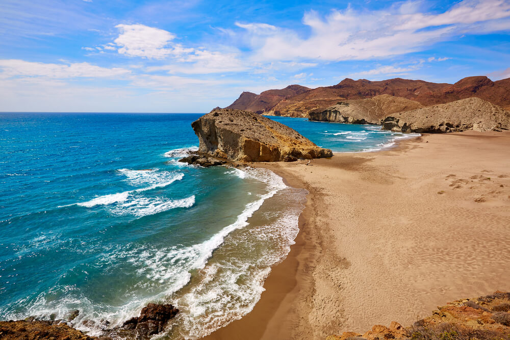 Spend Yellow Day lounging on one of Cabo de Gata’s beaches, like Monsul