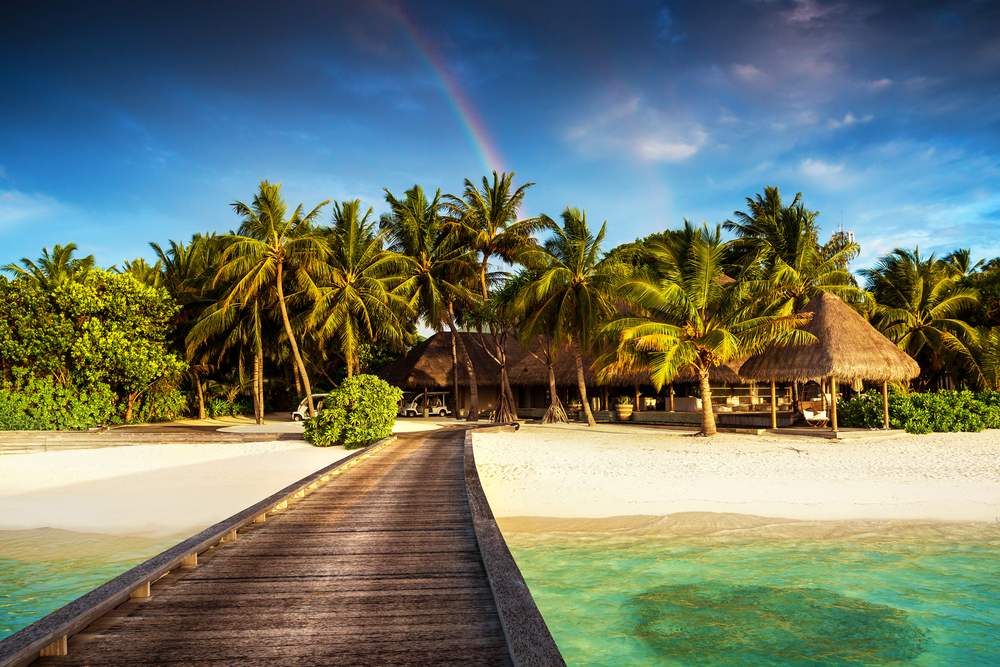 Beautiful exotic beach landscapeCuba: A beach resort with a rainbow