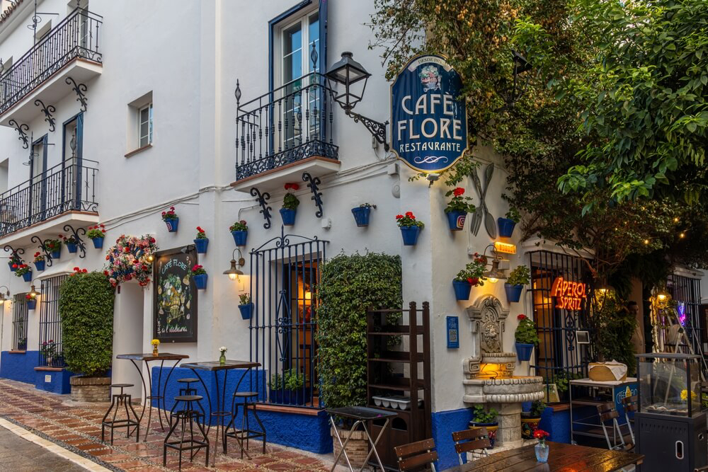 Marbella: A view of a traditional bar in Marbella with an outside terrace
