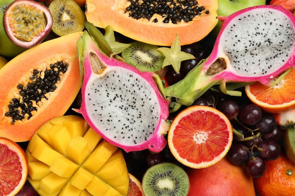 Exotic Fruits: A selection of tropical fruits sliced open