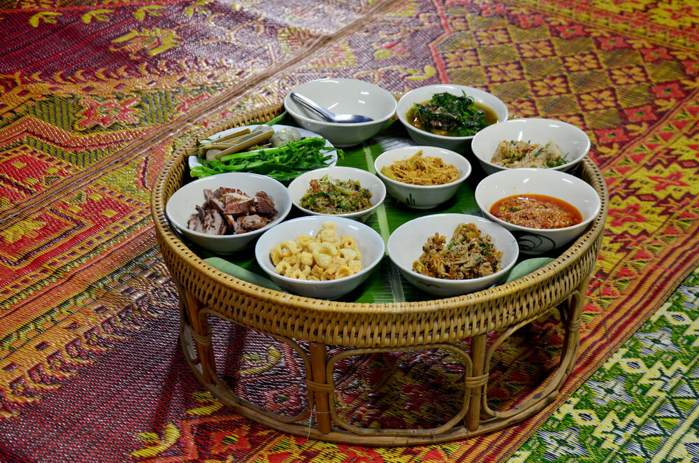 Khan Tok: A small round table with distinct dishes placed on top