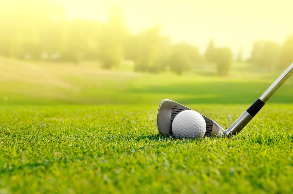 Golf breaks: A golf course with a couple playing golf