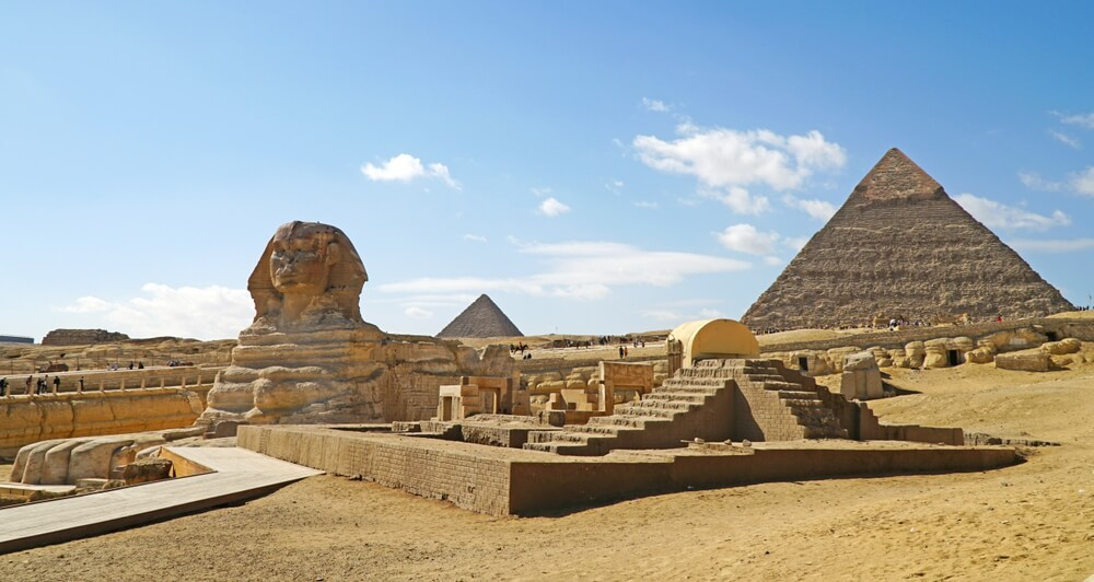 Necropolis: A view of the entire Giza necropolis with pyramids and the sphinx