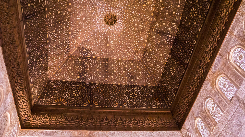 A close-up of the carved ceiling of the Ambassador’s Hall